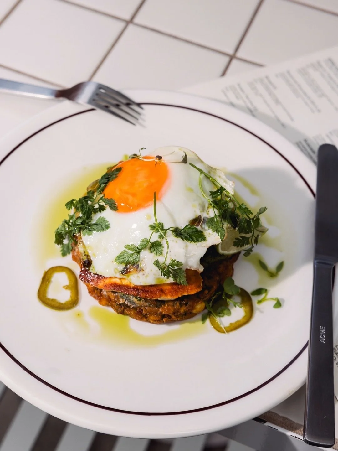 Not sure if you&rsquo;ve noticed, but there&rsquo;s a new breakfast on the menu. Corn fritters, green tomato and avocado pico de gallo, halloumi and a fried egg.

Available daily dine-in only