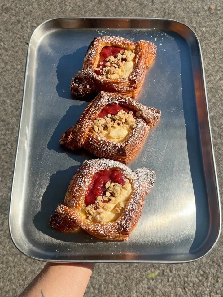 Rhubarb &amp; Strawberry Danish. Loaded with vanilla cream &amp; oat crumble. 

Available throughout July.