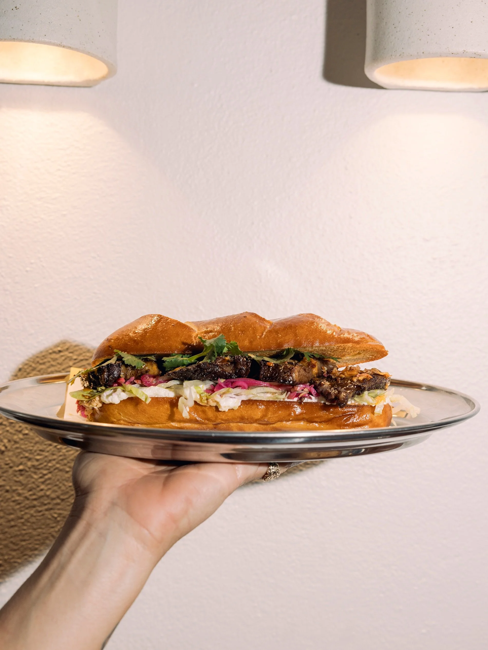 Introducing the Beef Short Rib Sub. 

Braised beef short rib, rosemary &amp; thyme labneh, harissa dressing, sumac pickled onions, pretzel submarine roll.

Available throughout September from 10 - 2 daily.