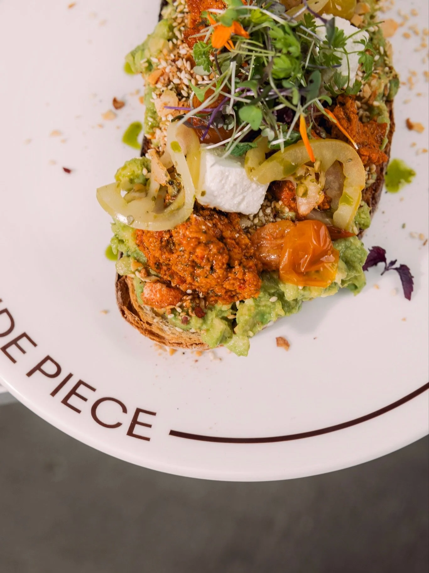 AVO TOAST.

Smashed avo, feta, confit tomato, romesco, pickled green tomato,  almond dukkah, sourdough

Available dine-in daily.