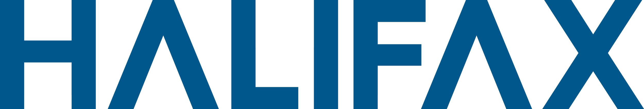 Close-up of the HALLAX store sign in bold blue letters.