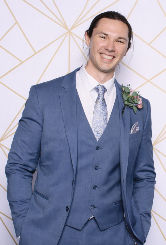 Image of Man in Blue Suit, Ehren Amarell the Co-founder of Precision Industrial Elevator