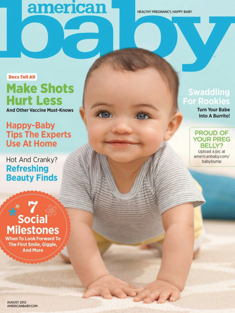 Cover of American Baby magazine featuring a smiling baby crawling on the floor with various headlines about pregnancy and baby care.