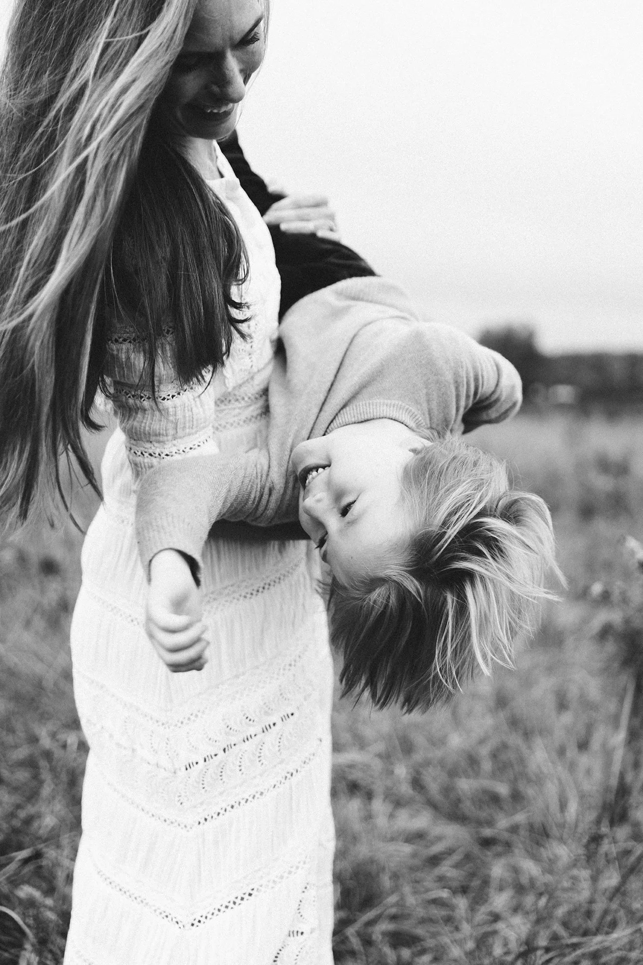 Westchester family photographer in a meadow