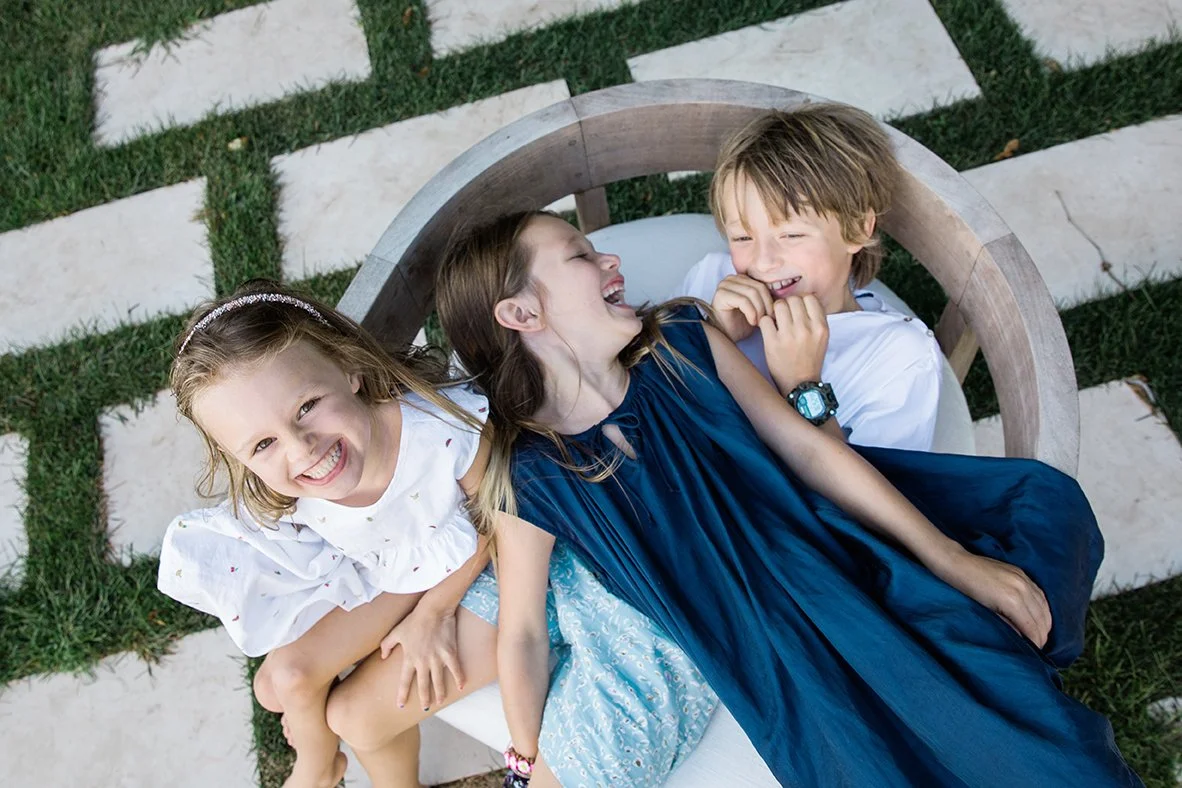 Hamptons family photographer siblings laughing summertime.jpg