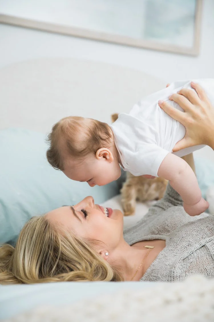 Mom with 5 month old baby at home