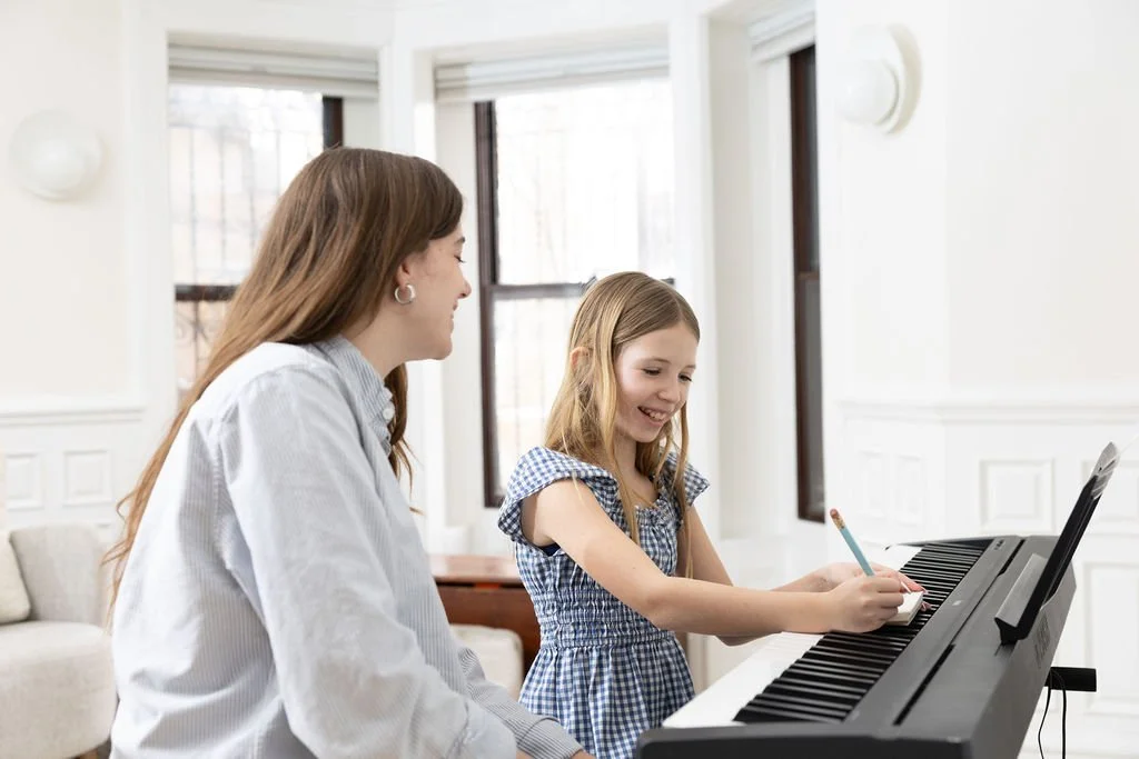NYC-lifestyle-photographer-piano-lesson-girl-after-school.jpg