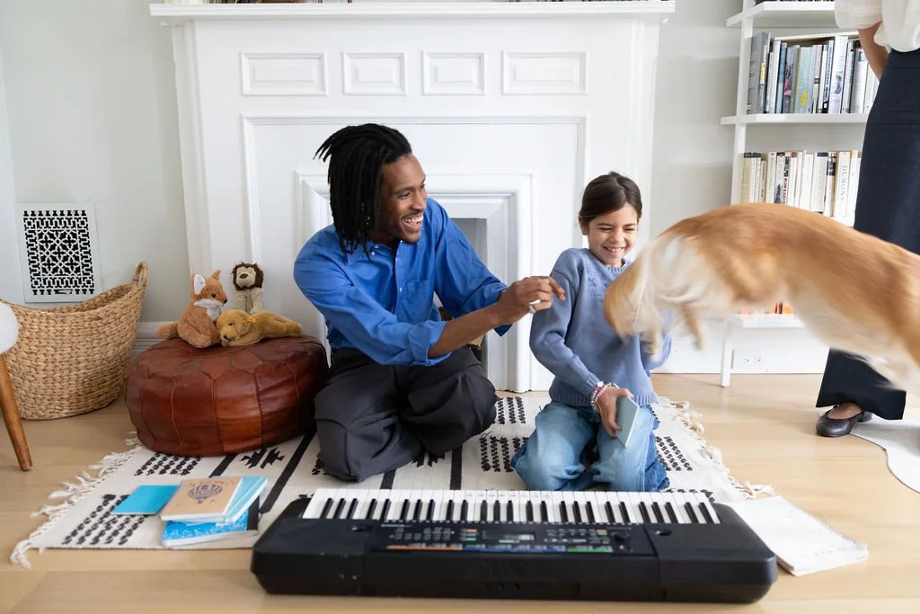 Music lesson at home in Brooklyn with dog
