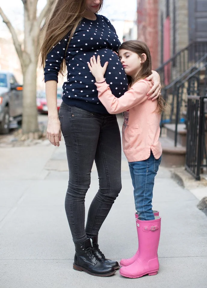 Expecting NYC mom with sibling belly bump