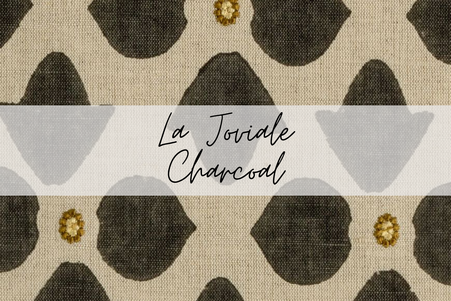 Text overlay reading 'La Tovade Charcoal' on a patterned fabric background with black and beige designs and small floral accents.