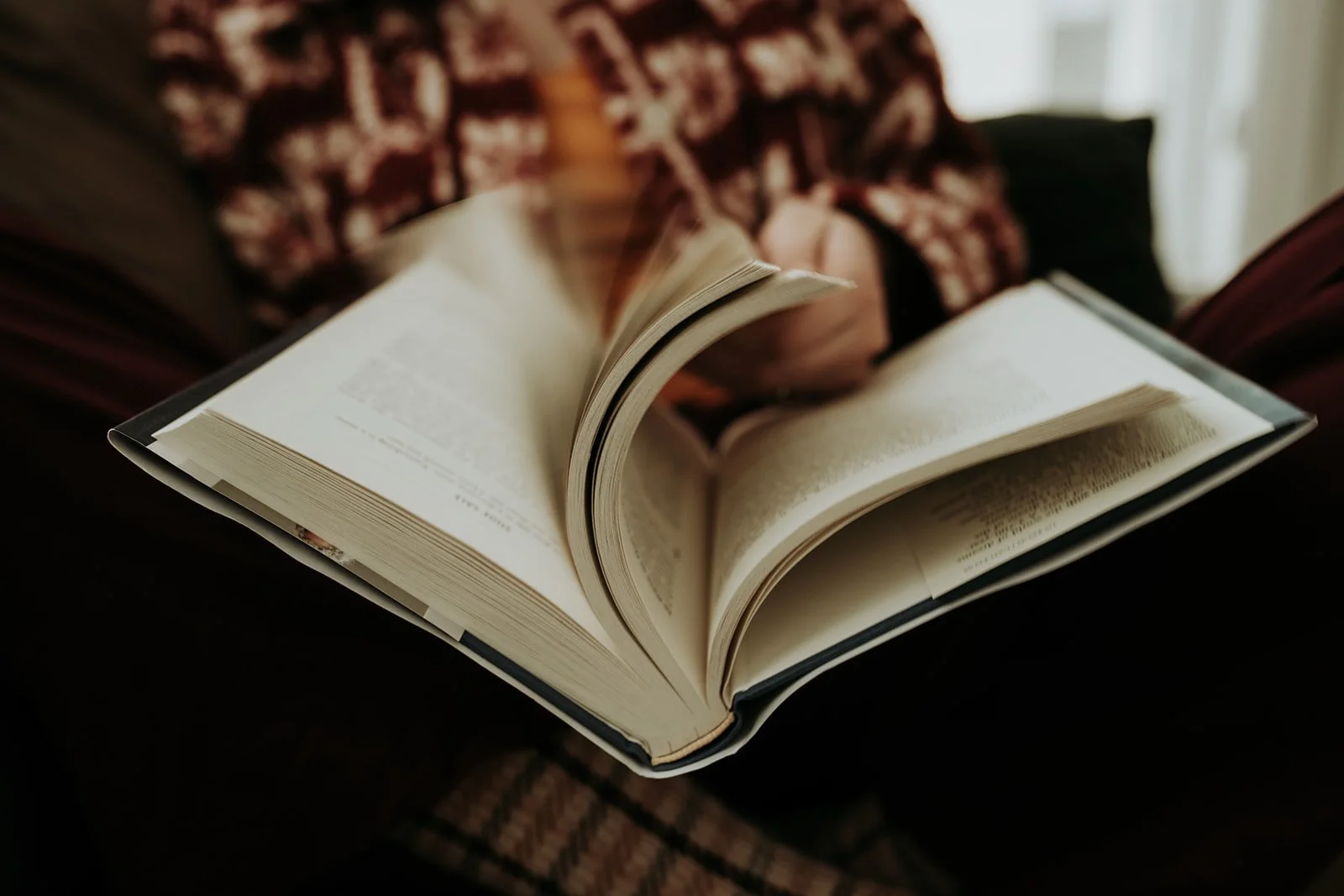 Book with pages open.