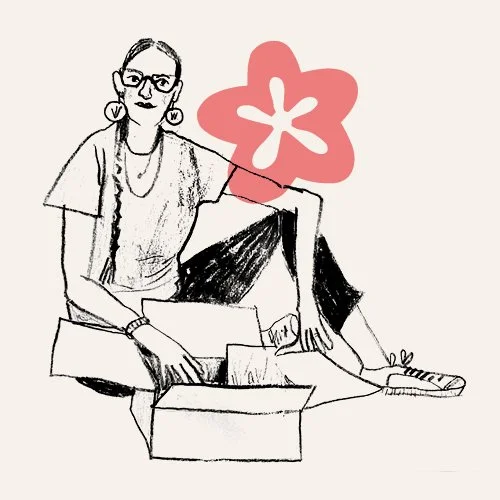Line drawing of a woman sitting cross-legged with a pink flower shape in the background, wearing glasses, earrings, a t-shirt, and sneakers, with an open box in front of her.