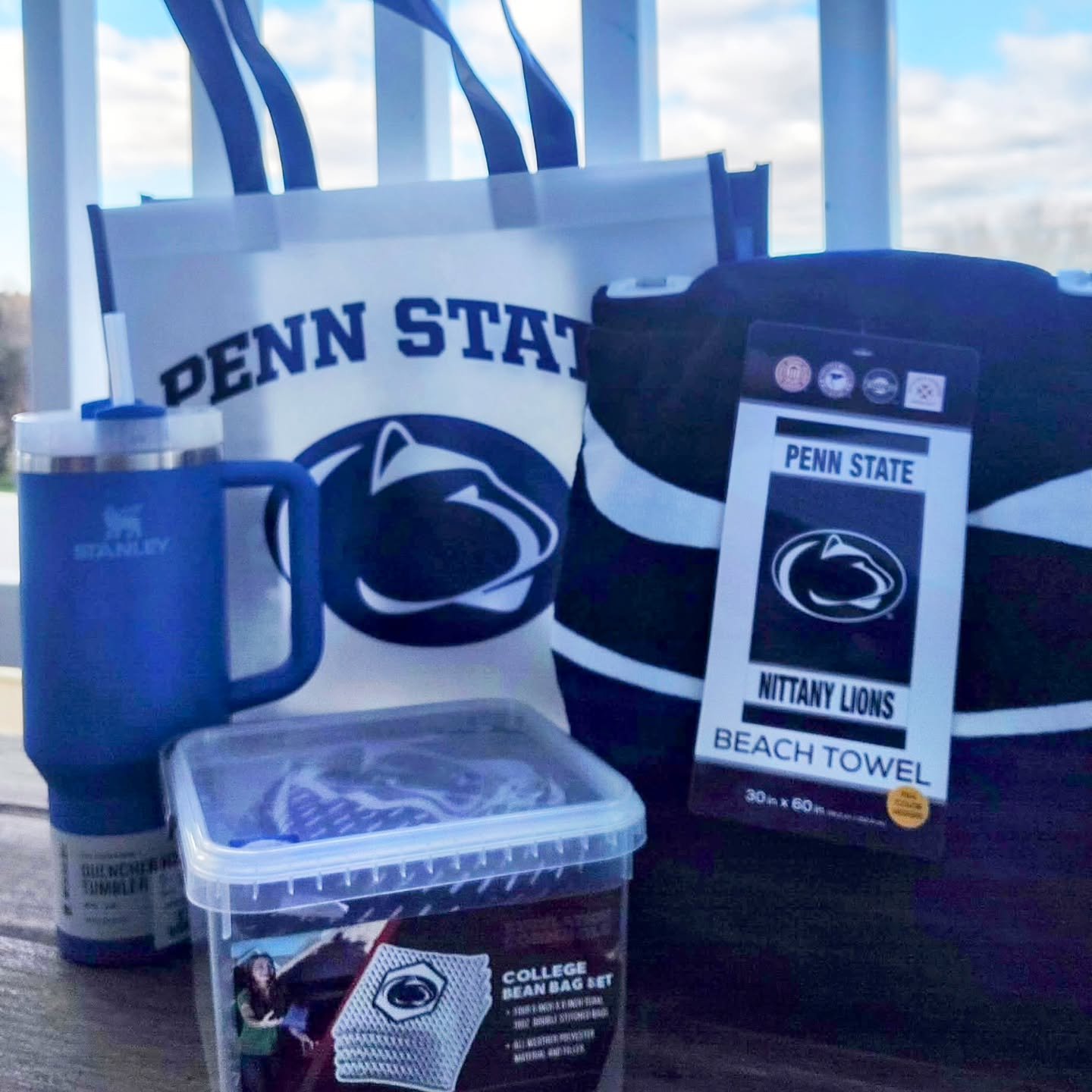 Warmer days ahead call for a sunny day fun kit ☀️

Complete with the perfect beach towel to catch your tan and show off your PSU pride, a Stanley to stay hydrated in the heat, and a PSU bean bag set for all your cornhole game needs-- whether in the b