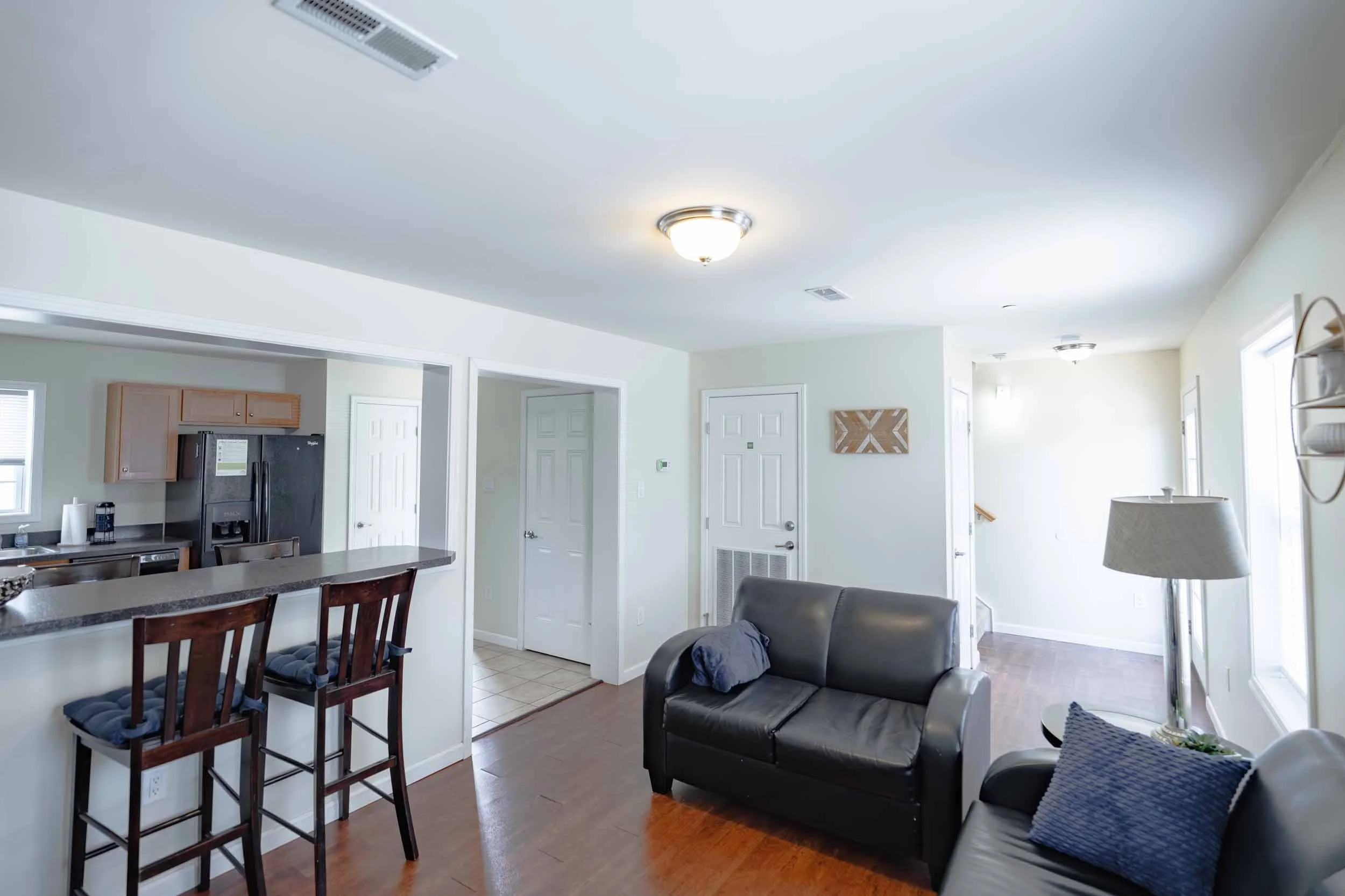 The Villas at Happy Valley | Off-Campus Apartments in State College, PA near PSU | Living Room and Kitchen