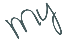 Close-up of handwritten text 'my' on a black background