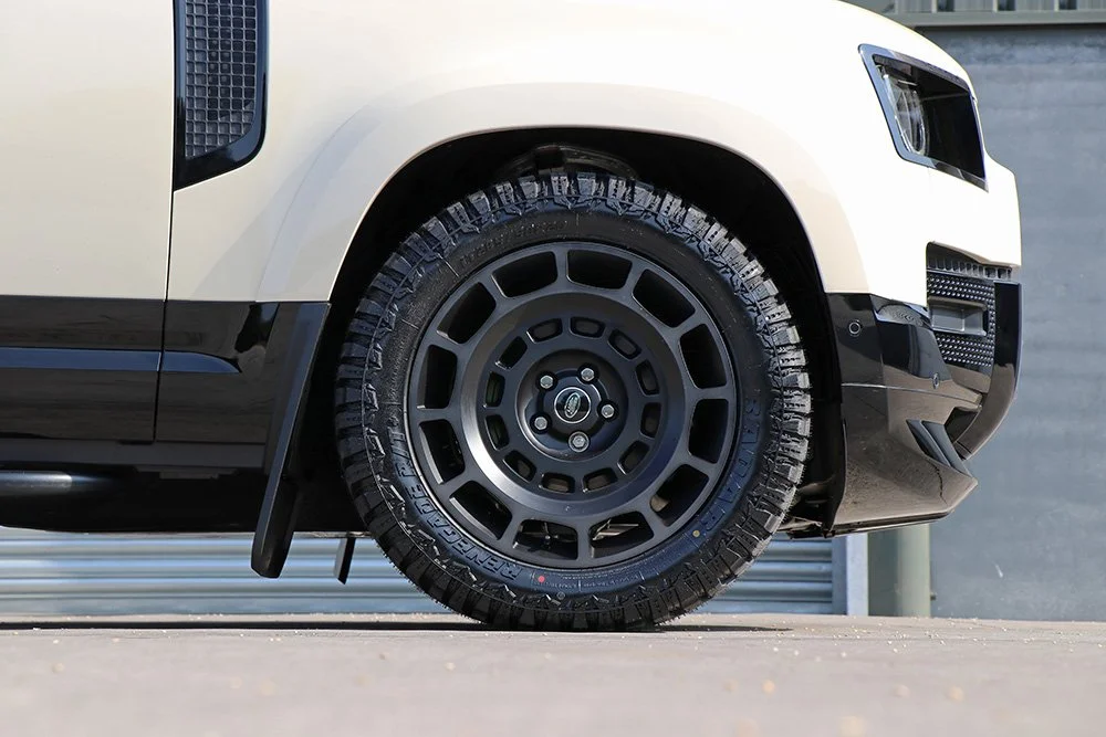 Defender 110 cream wrap SEEKER Octavia wheels 1.jpg