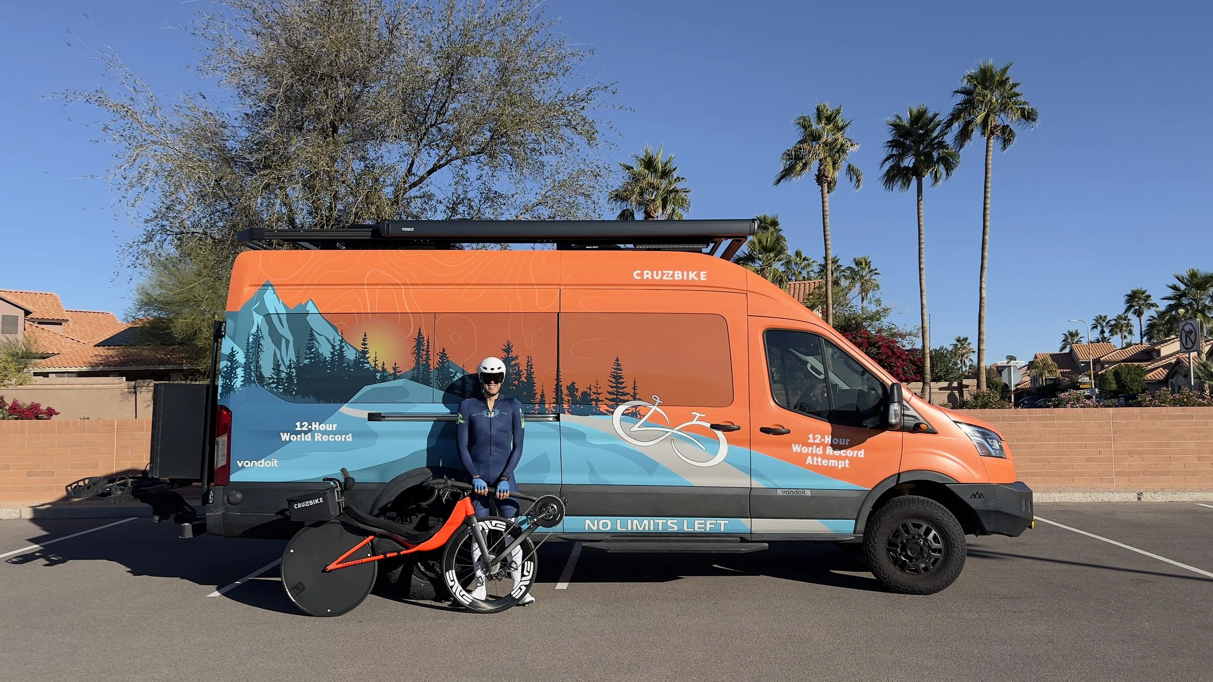Matthew Lefthand in front of Van with Recumbent Cruzbike