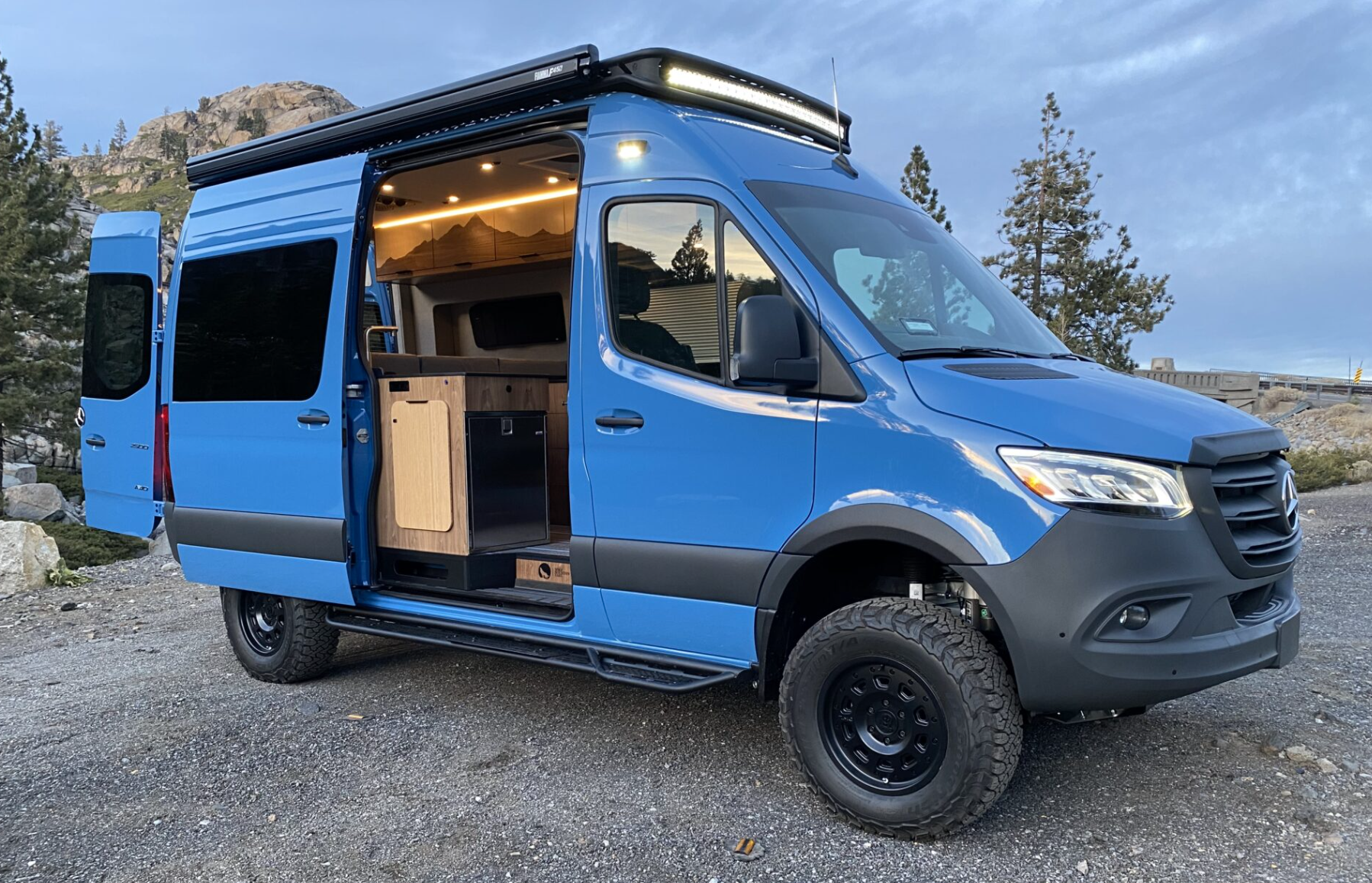 mountain wolf vans showcasing a stella 144' sprinter van fully converted in the mountains