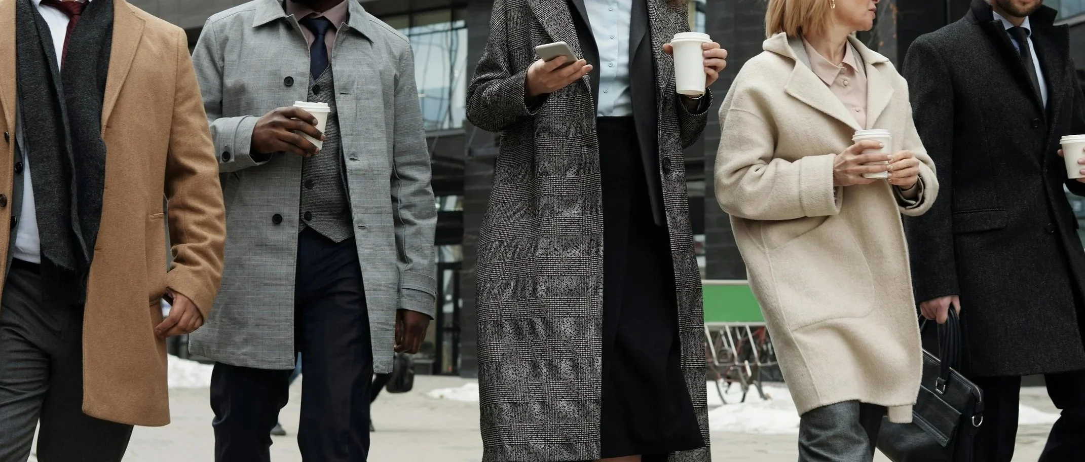 Executive coaching with driven business professionals discussing leadership strategy