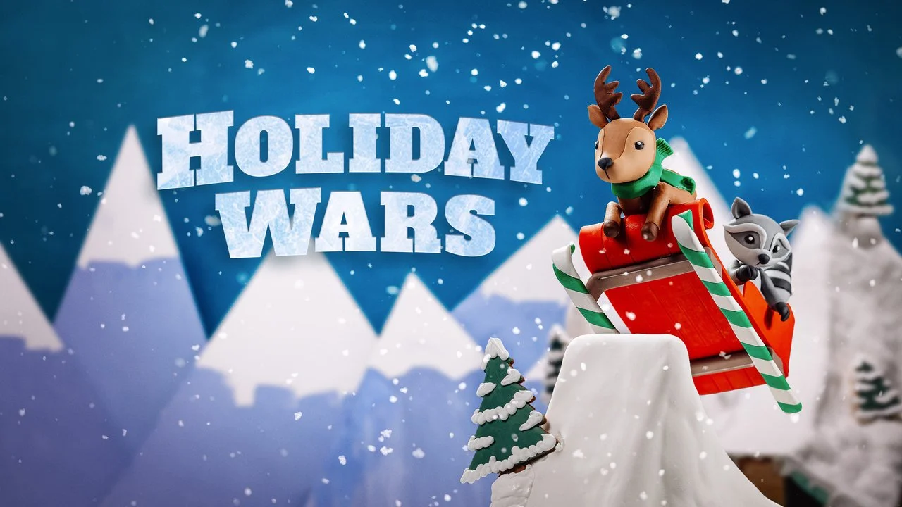 A Christmas-themed scene with a toy reindeer and raccoon on a red sleigh, in a snowy mountain landscape, with bold text reading 'Holiday Wars'.