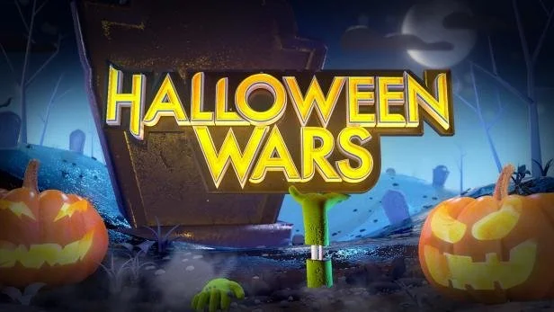 Halloween Wars title screen with pumpkins, graveyard, and a green hand emerging from the ground.