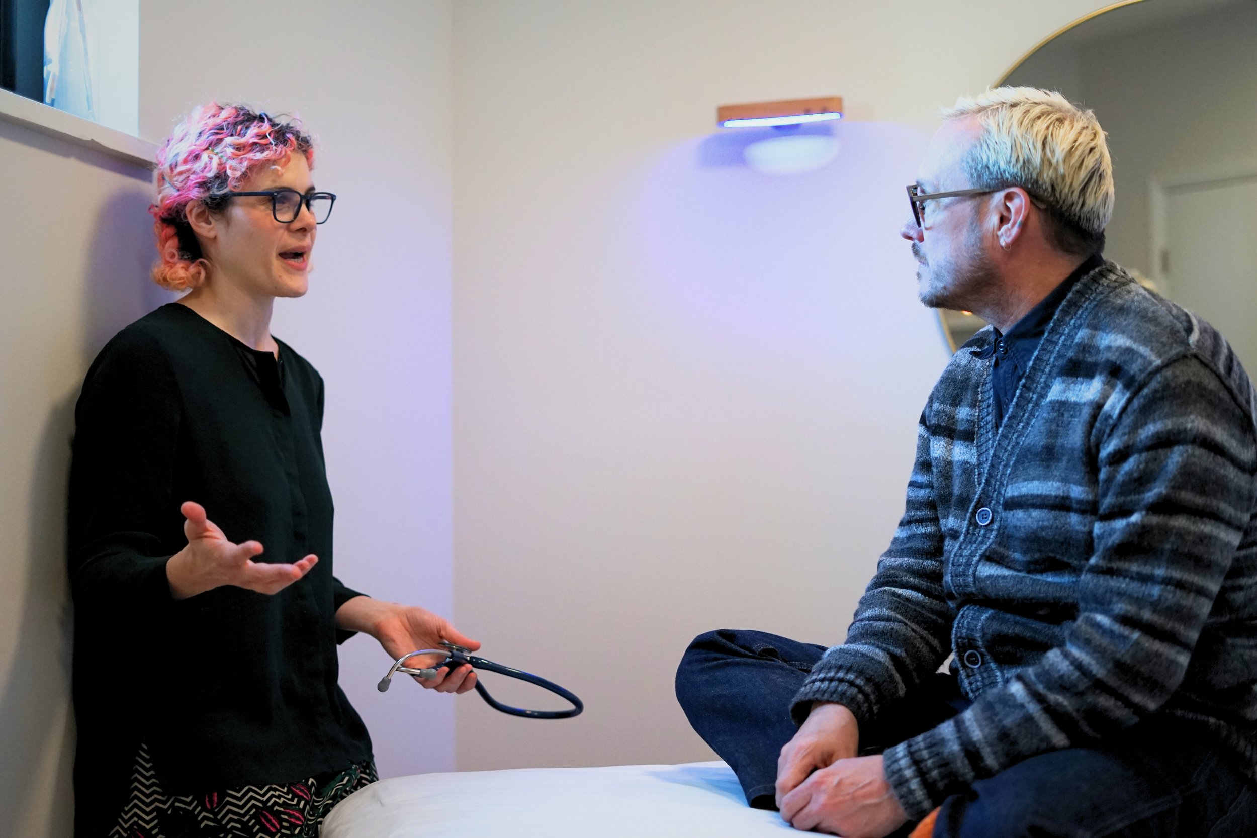 Dr Rodrigues explains a treatment plan to her patient