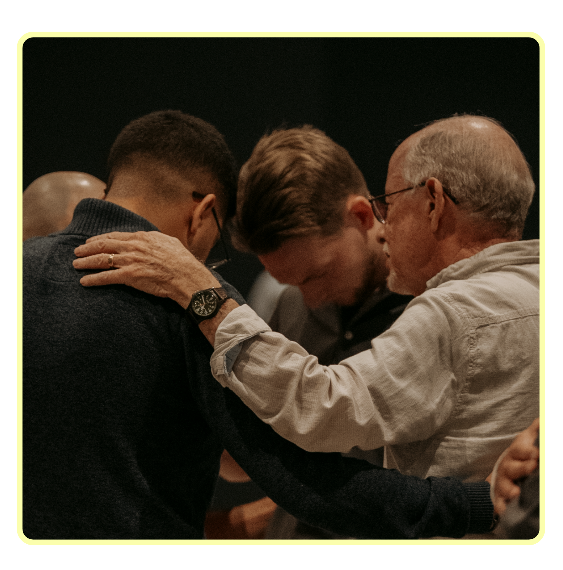 Pastors engaged in prayer