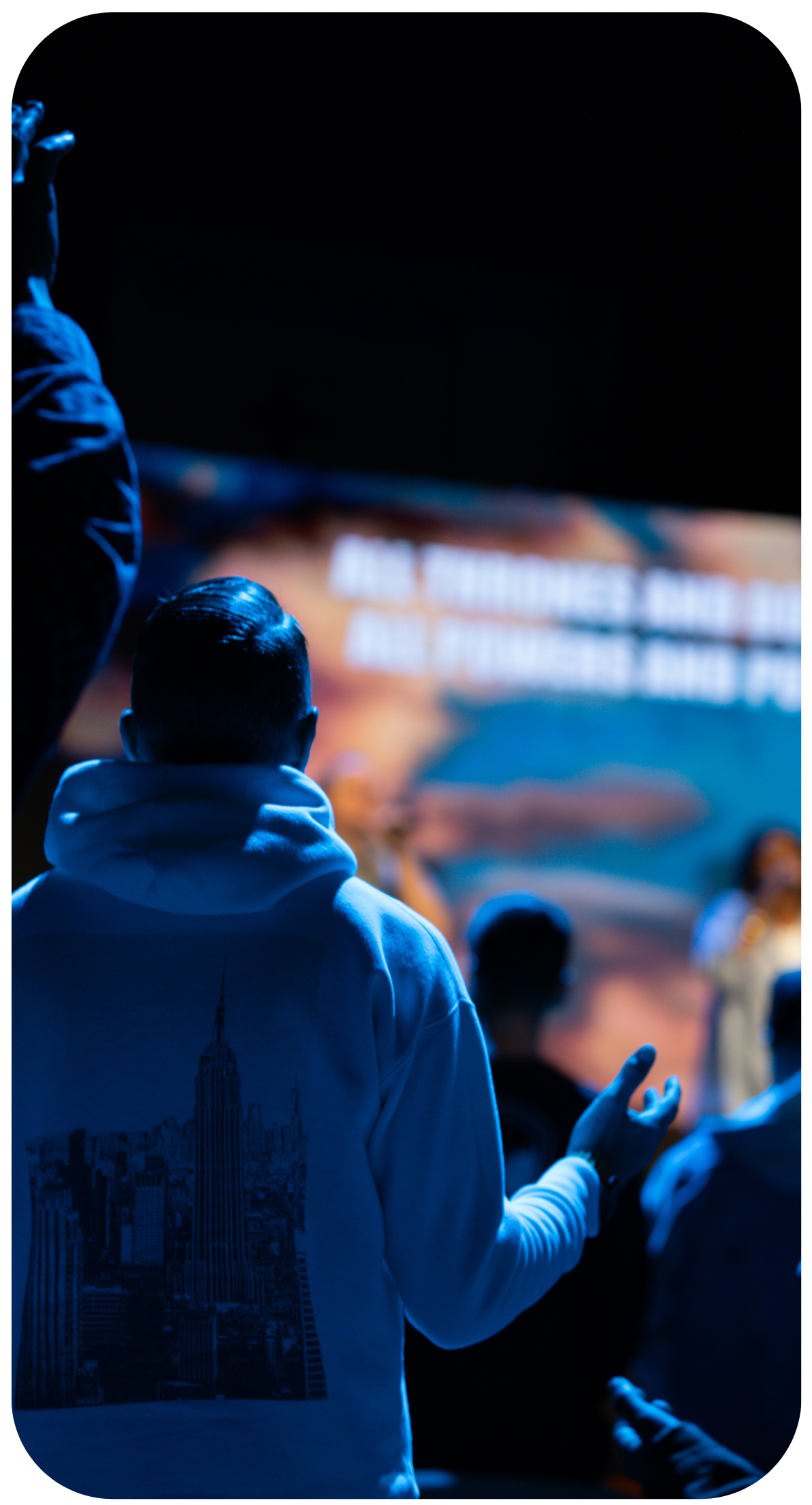 People singing in worship at Church United gathering