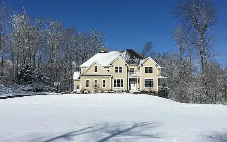 house on a snow covered hill