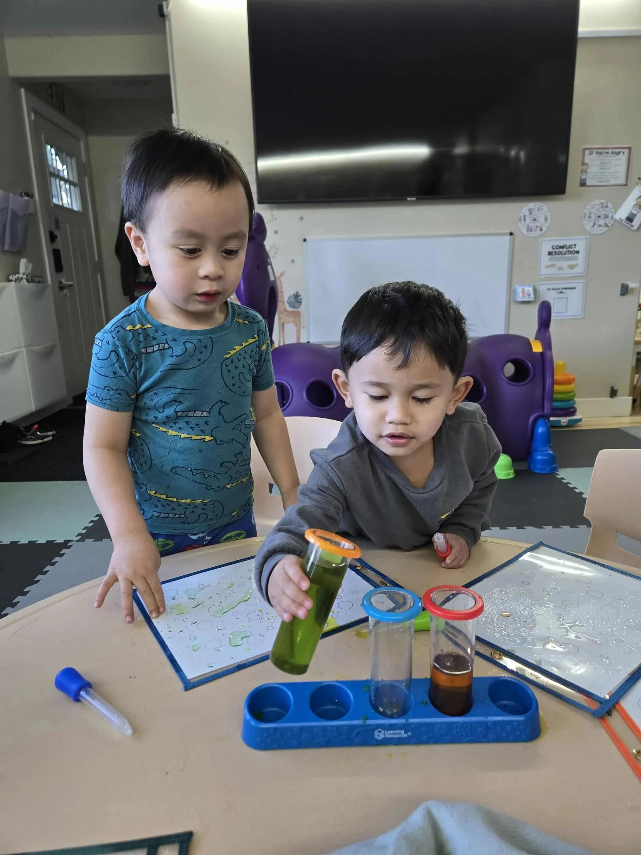 Exploring colours, movement, and cause and effect through hands-on discovery.