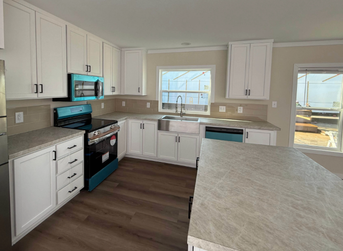 Marathon Homes - Shojo White with Crescent White Cabinets, Taj Mahal Countertops, Urban Putty Backsplash, and Benton Flooring.png