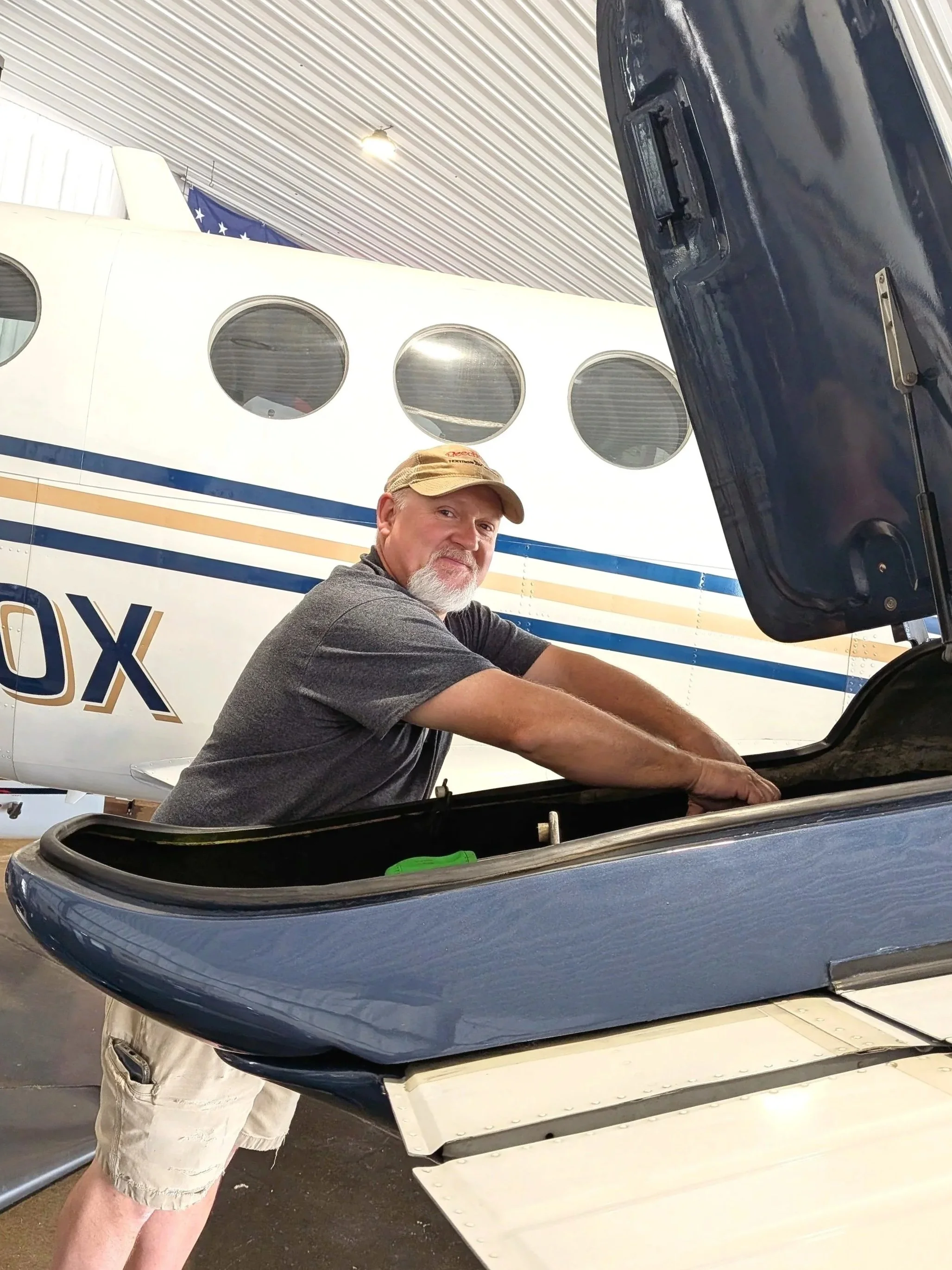 Lead Mechanic repairing aircraft