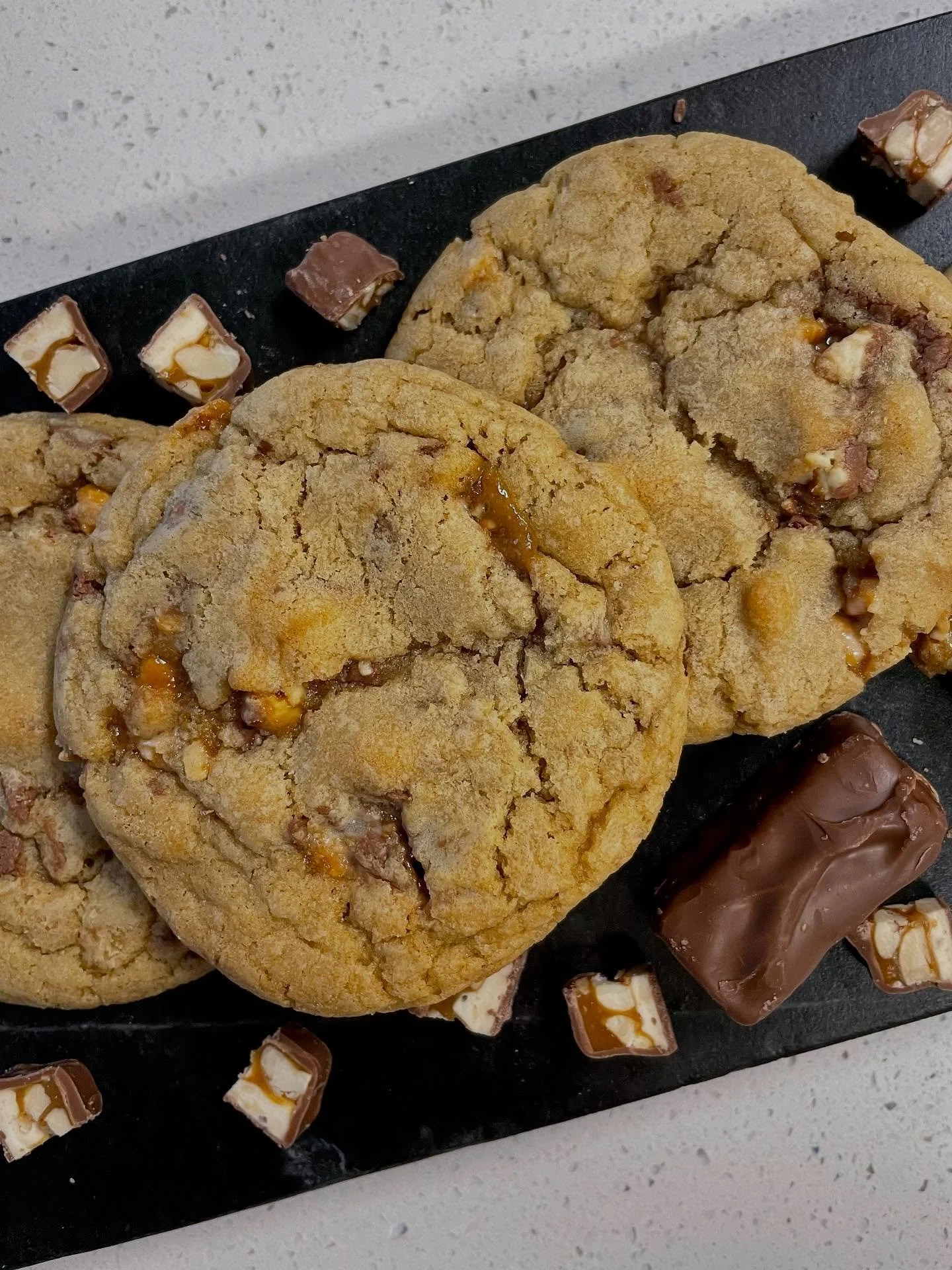 What better way to get rid of leftover Halloween candy than by chopping it up and mixing it into cookie dough?  First batch features original Snickers, second batch features Peanut Butter Snickers. 🍪

#homebaker #homebaking #homebakery #cottagefood 