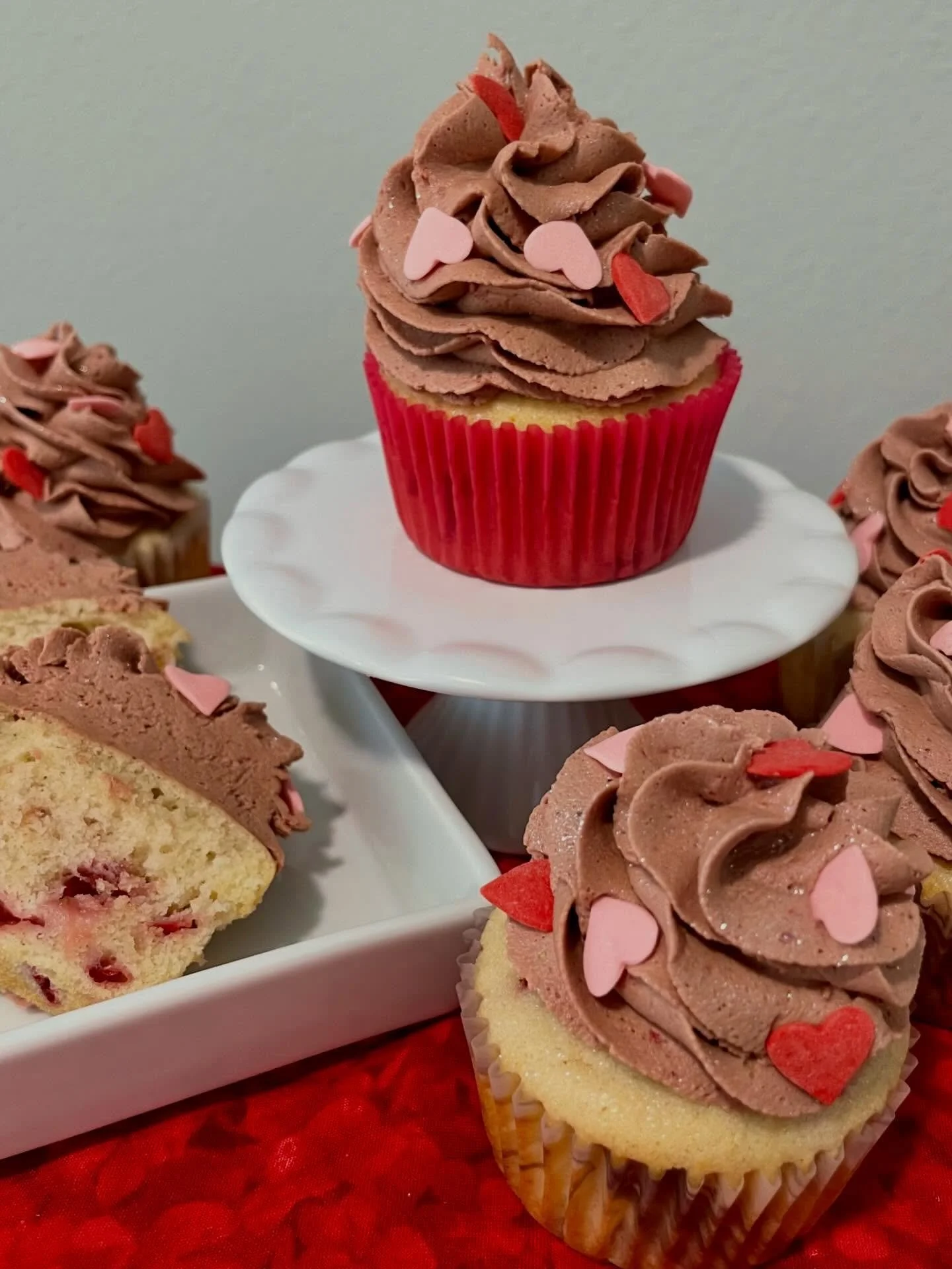 The second Valentine bake was Chocolate Covered Strawberry Cupcakes. I started with fluffy vanilla cupcakes filled with diced strawberries, then frosted them with a chocolate strawberry buttercream. For an extra special touch, I topped them off with 
