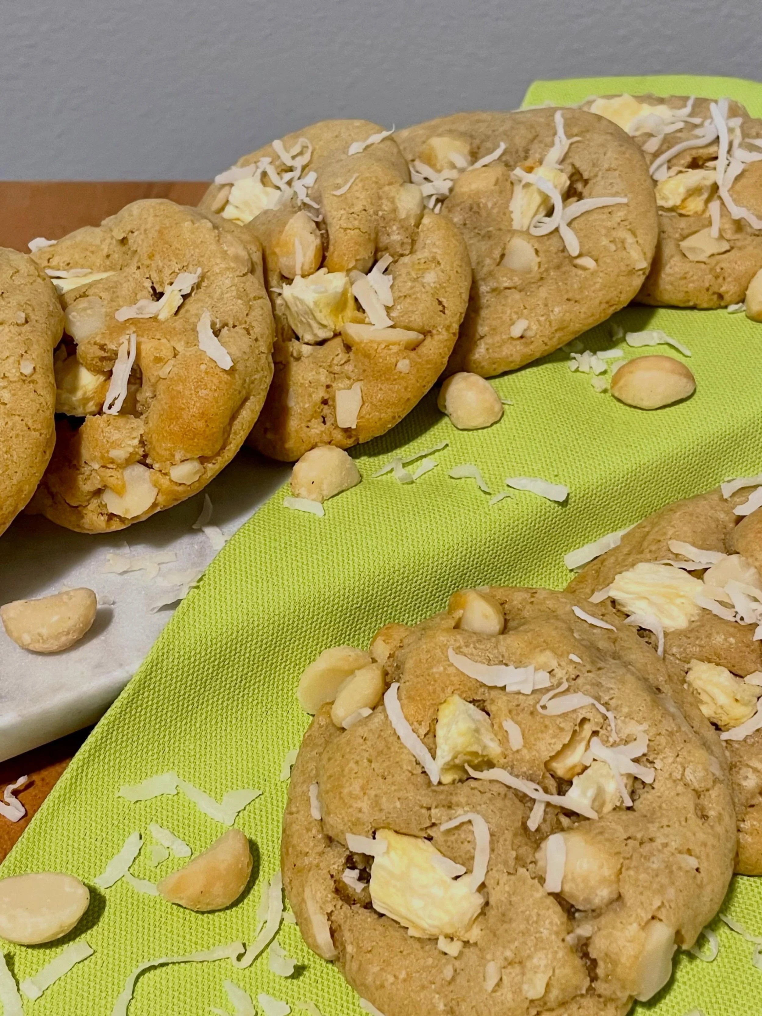 Channeling beach vibes with my Tropical Paradise Cookies 🏖️🍍🥥

I filled my classic cookie base with chopped macadamia nuts, chunks of freeze dried pineapple, shredded coconut, and a touch of coconut extract.

#homebakery #microbakery #smallbusines