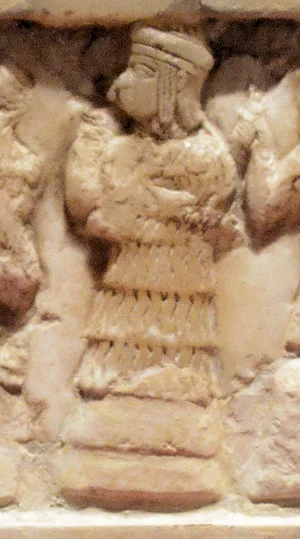 Vertical detail of the central high-priestess figure on the Disk of Enheduanna