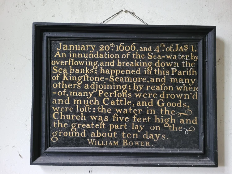 Flood marker plaque at Kingston Seymour recording the 1607 high-water level.