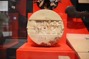 Reconstructed calcite Disk of Enheduanna showing a ritual scene