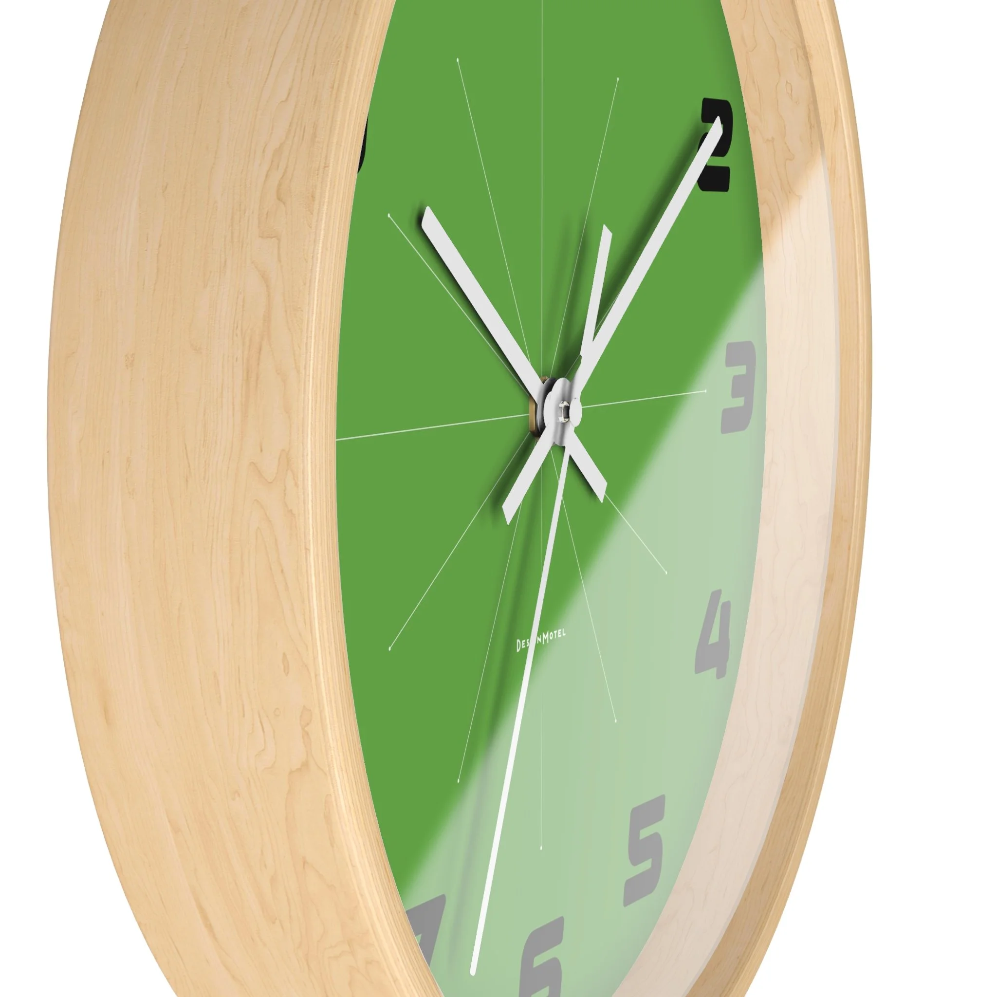 A natural wood wall clock with green face, black numbers, and white hour, minute, and second hands showing the time as approximately 2:09.