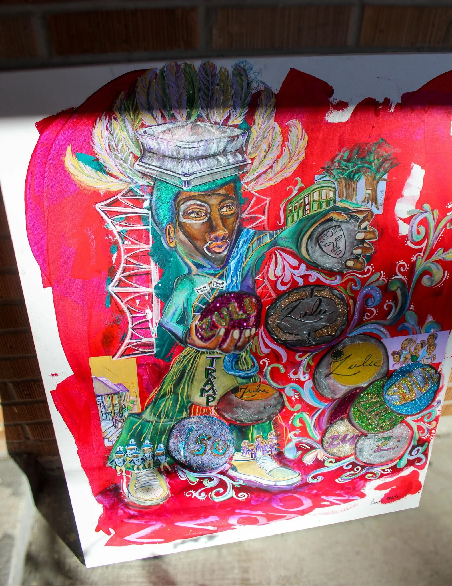 Colorful artwork on canvas featuring a woman with a headdress of feathers and a large bowl, surrounded by various symbols and vibrant designs.