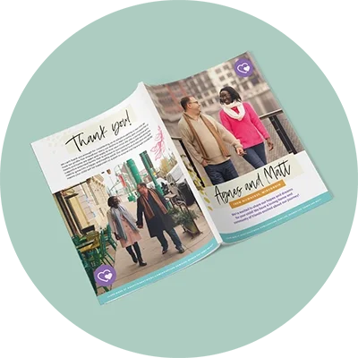 Open magazine with photos of a couple walking outdoors, one on a city street, and the other on a bridge. The pages include text saying 'Thank you!' and the names 'Agnes and Matt'.