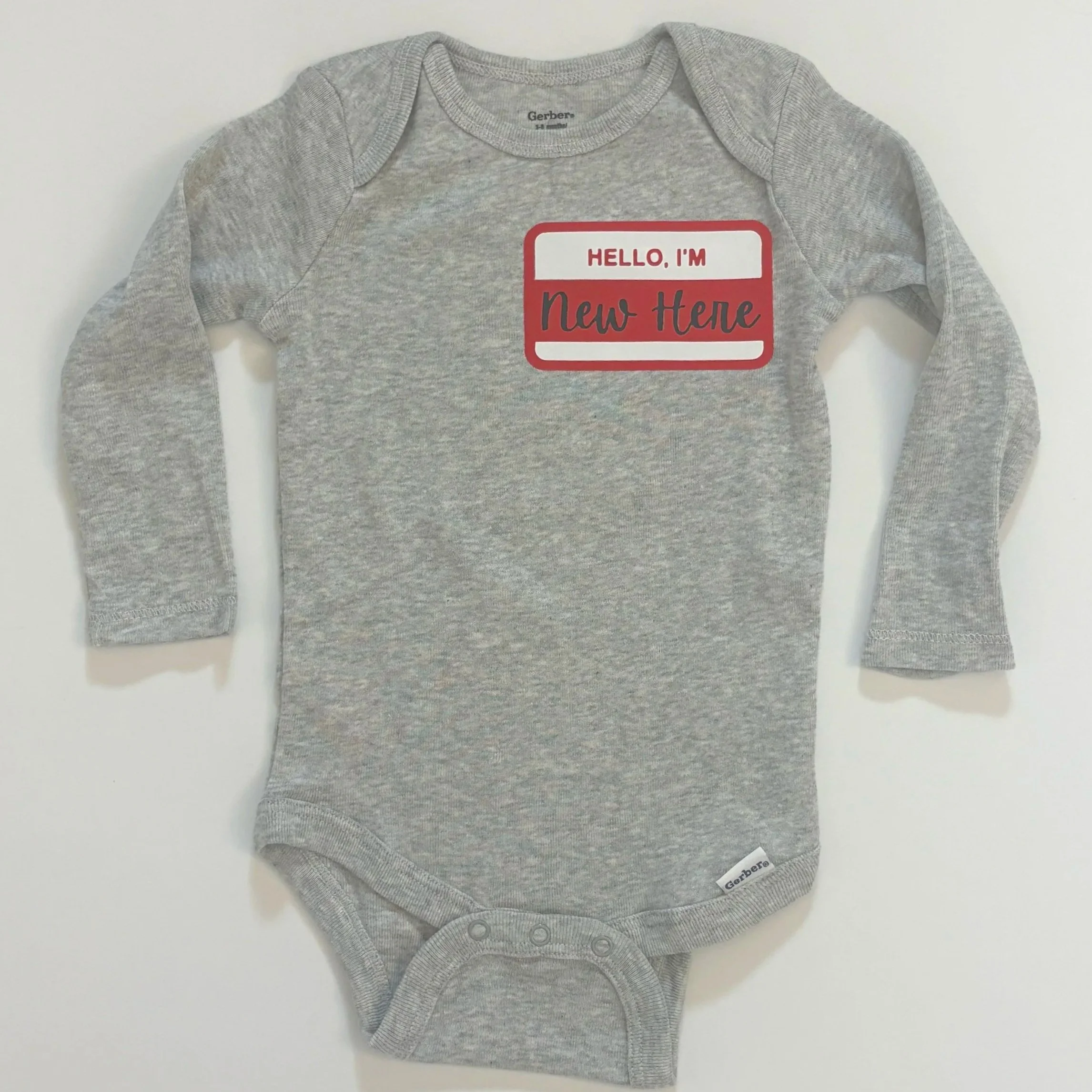 New Here Onesie
