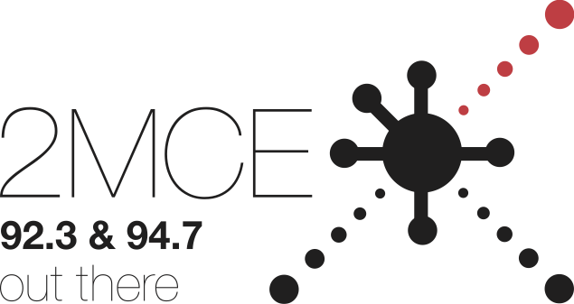 A logo for 2MCE radio station with frequencies 92.3 and 94.7, featuring a stylized black and red virus particle graphic and the slogan "out there".