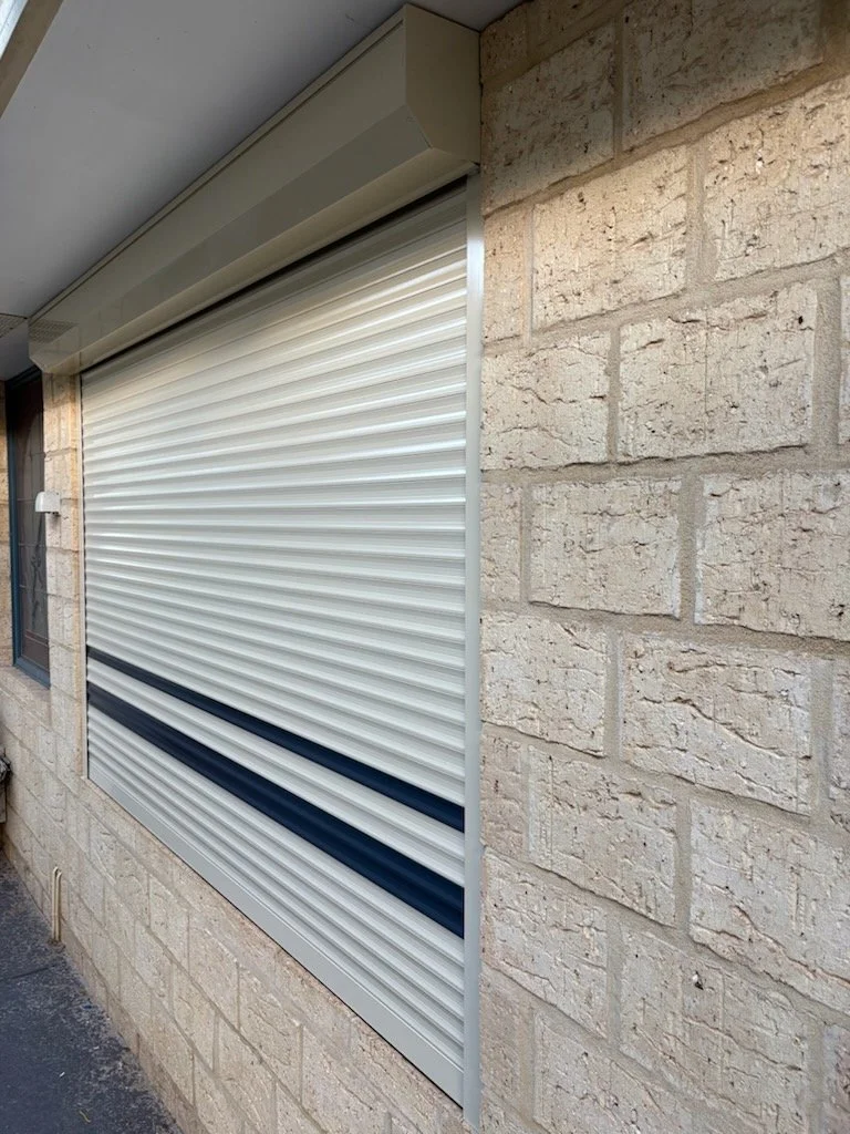 Cream Security roller shutter with Deep Ocean slats help give this Roller Shutter in South Bunbury a modern look. Installed for a client to help their young baby get a better sleep, Blocking out sun and also offering protection and reducing external