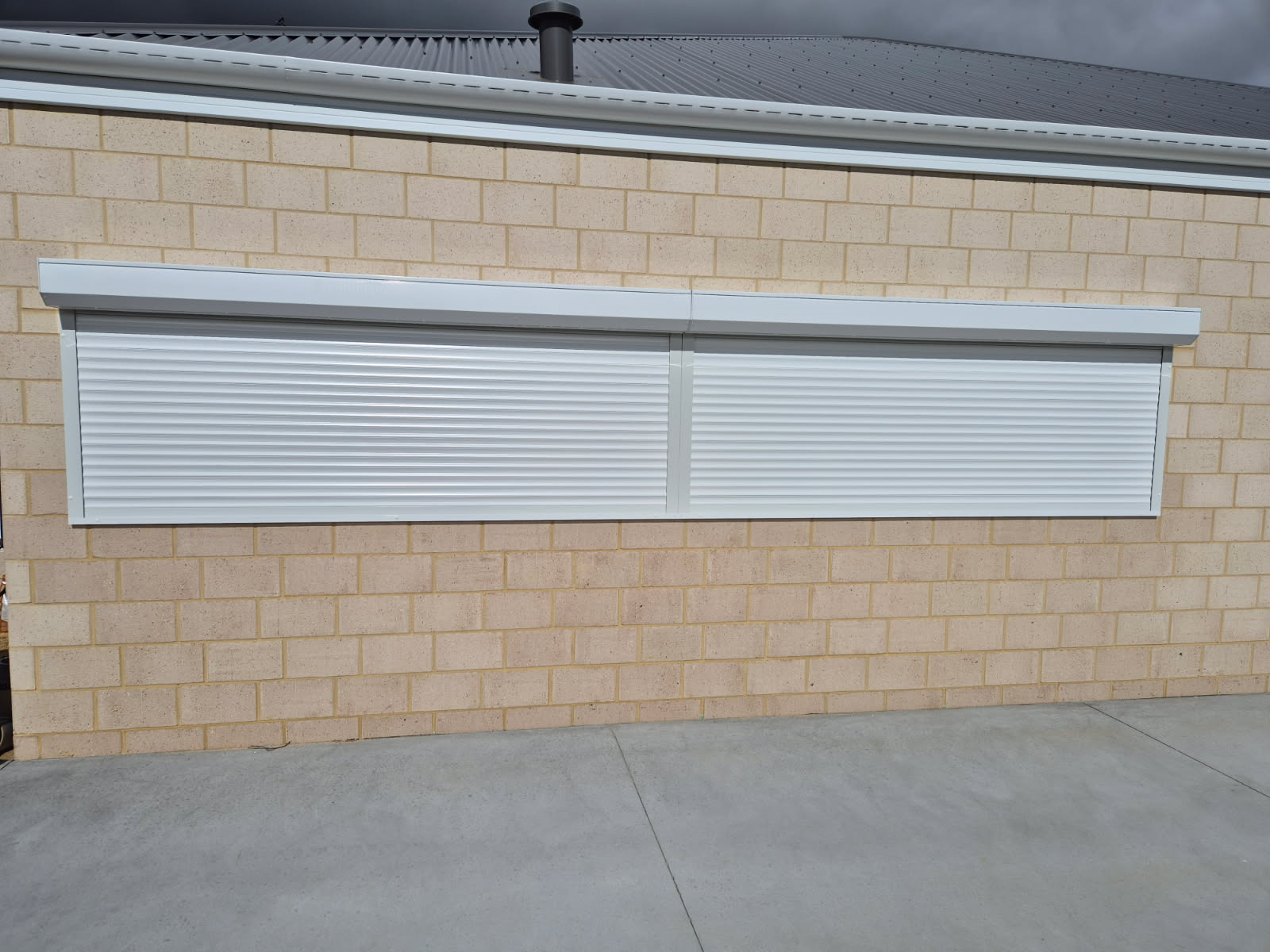 Joint Window Roller Shutters on this beautiful Bunbury home. White in colour and Remote operated. To improve privacy as well as increase security for the clients young family. All while giving a sleek look and protecting against the harsh morning sun