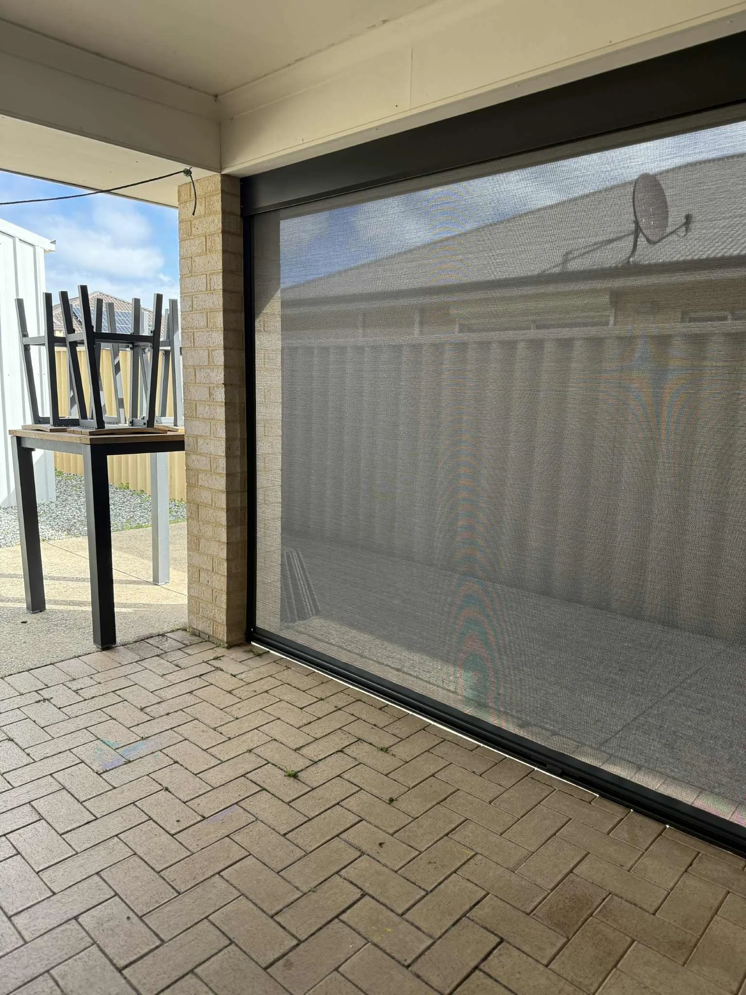 Ziptrak Outdoor Blind for our Bunbury Client. 99% Vistaweave Mesh. 'Storm' coloured with a Monument coloured frame. Perfect for keeping Wild bunbury weather out and making their outdoor space into another useable room