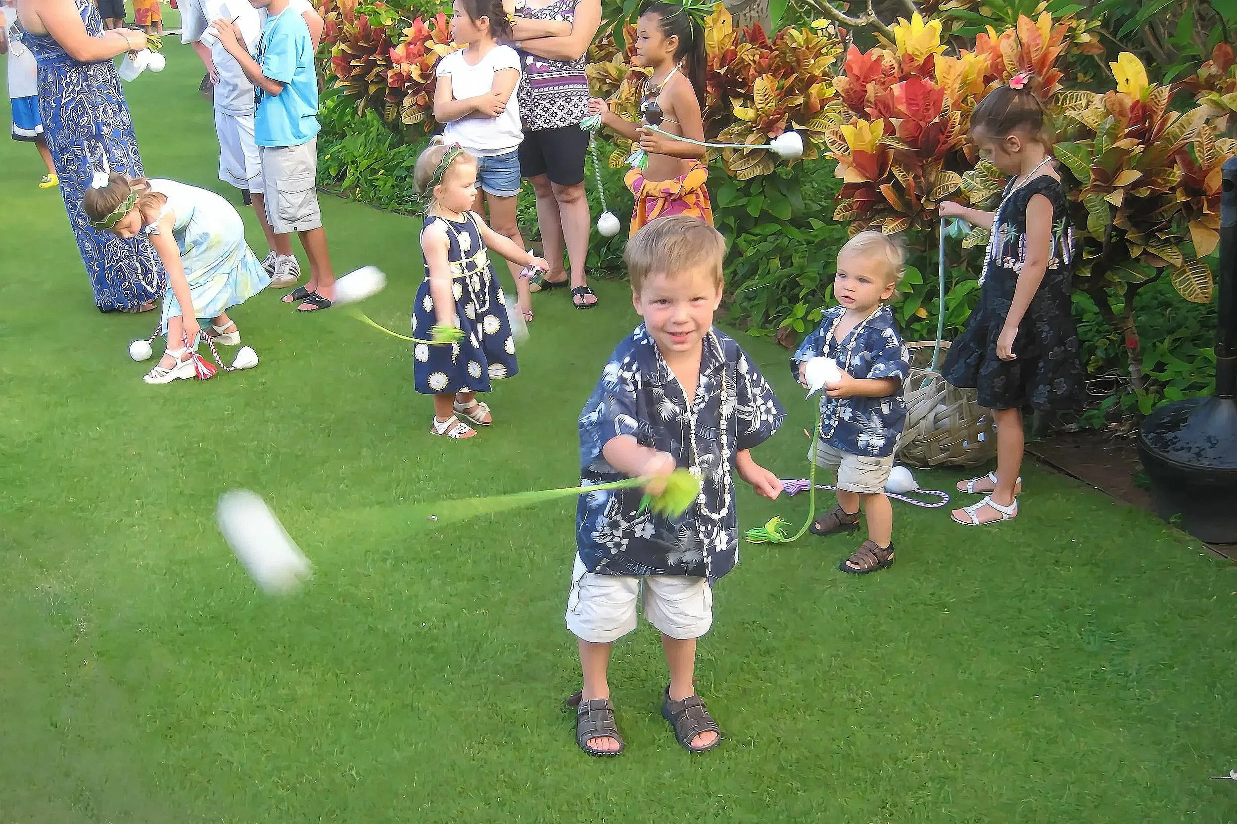 The kids loved learning to twirl poi balls at the luau.