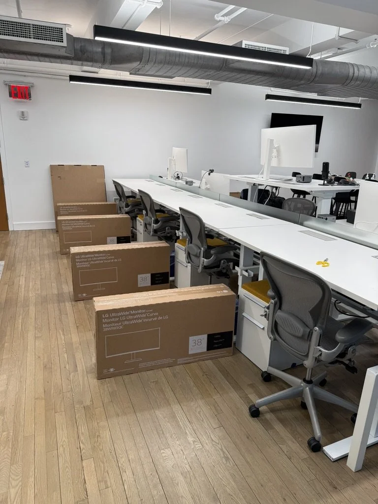 Setting up workstations in new office move.