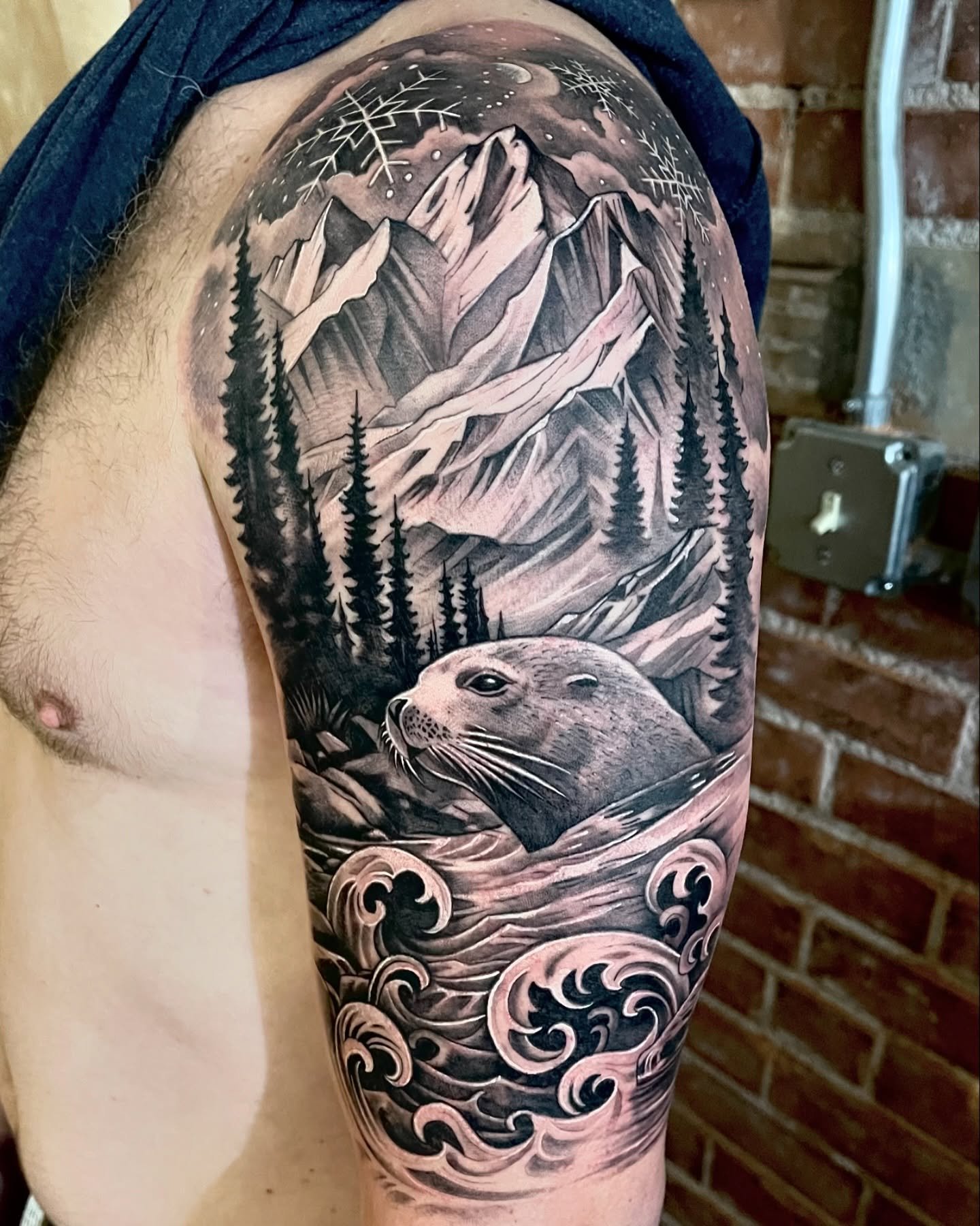 Fun one from a little while ago! #tattoosbyclint #blackandgrey #armtattoo #halfsleeve #animaltattoo #watertattoo #mountains #nature #woods #ocean #coloradotattooer