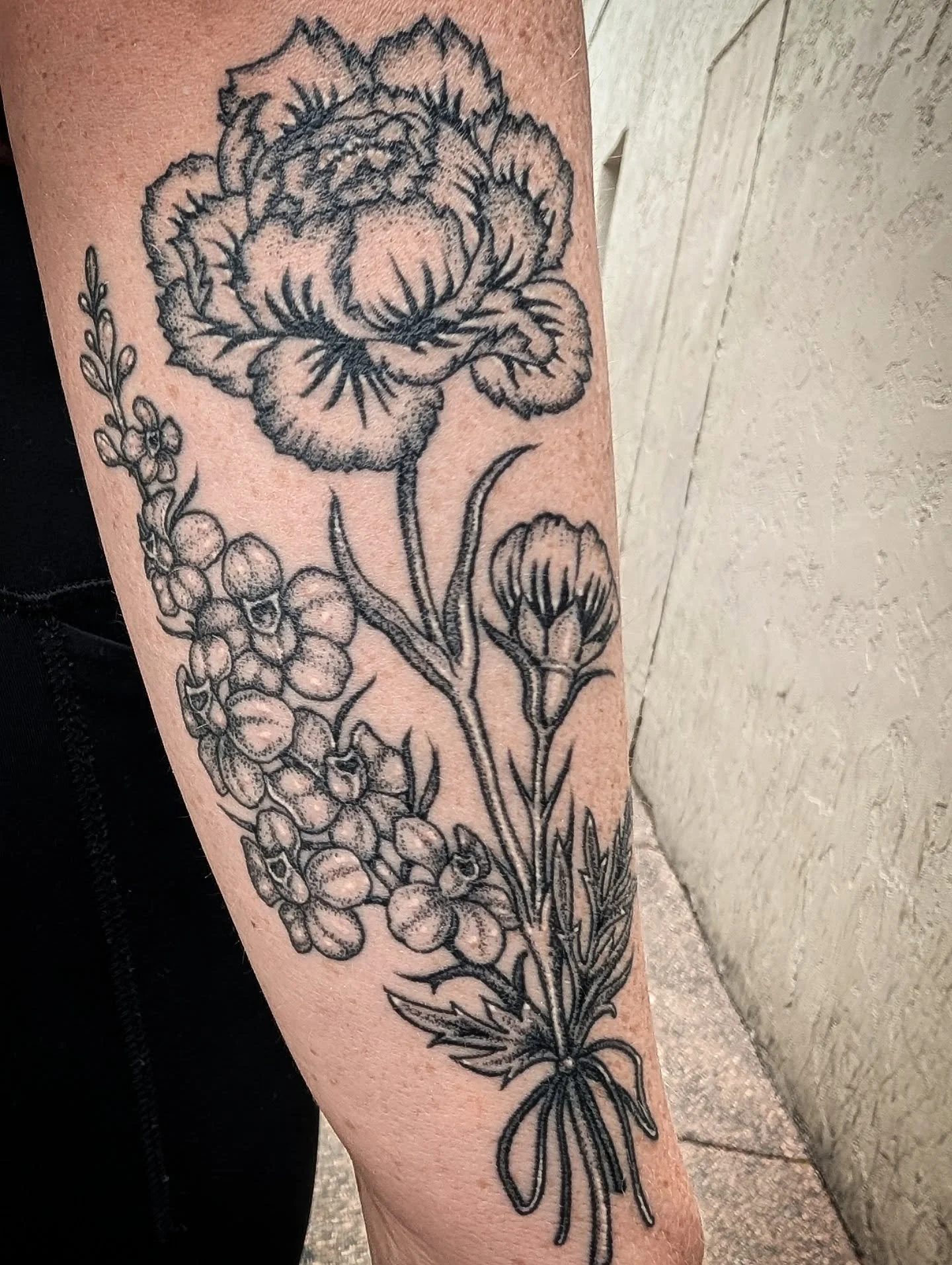 Carnations and larkspur for Kelly.